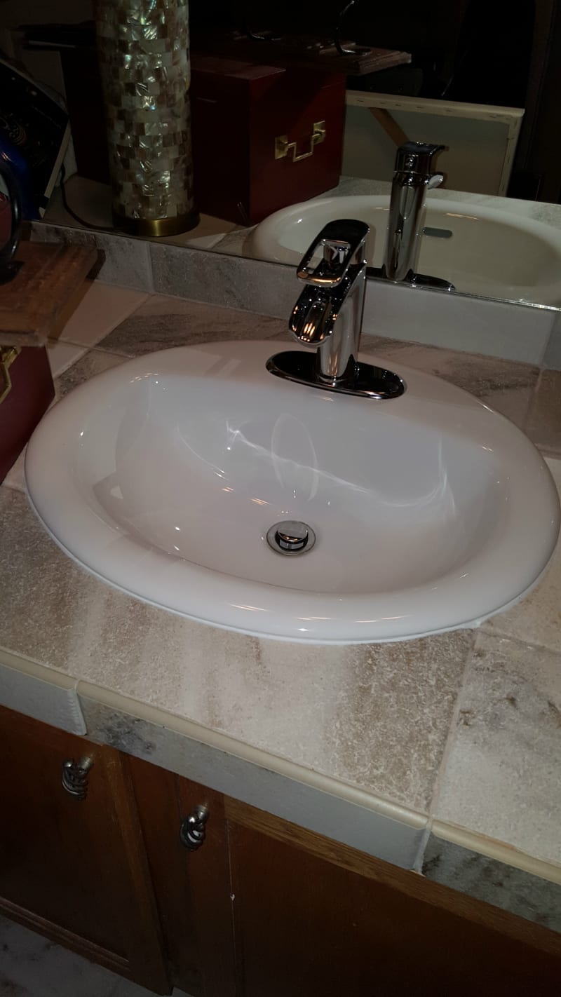 Inspection Resolution General Contractors - bathroom vanity and sink before